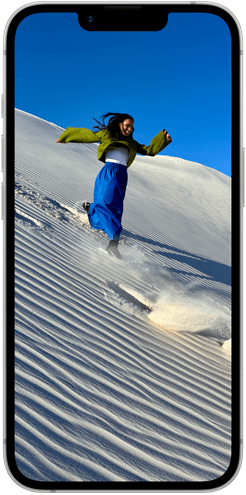 People walking down sand dune on iPhone 16e Super Retina XDR Display